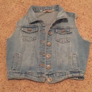 Sleeveless blue jeans jacket